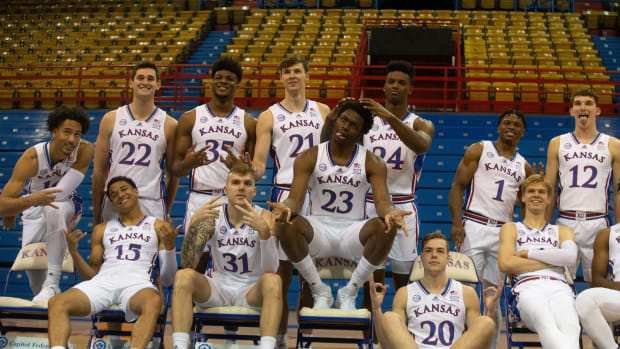 The Kansas men's basketball team take a goofy picture following their professional group shot during media day inside Allen Fieldhouse.